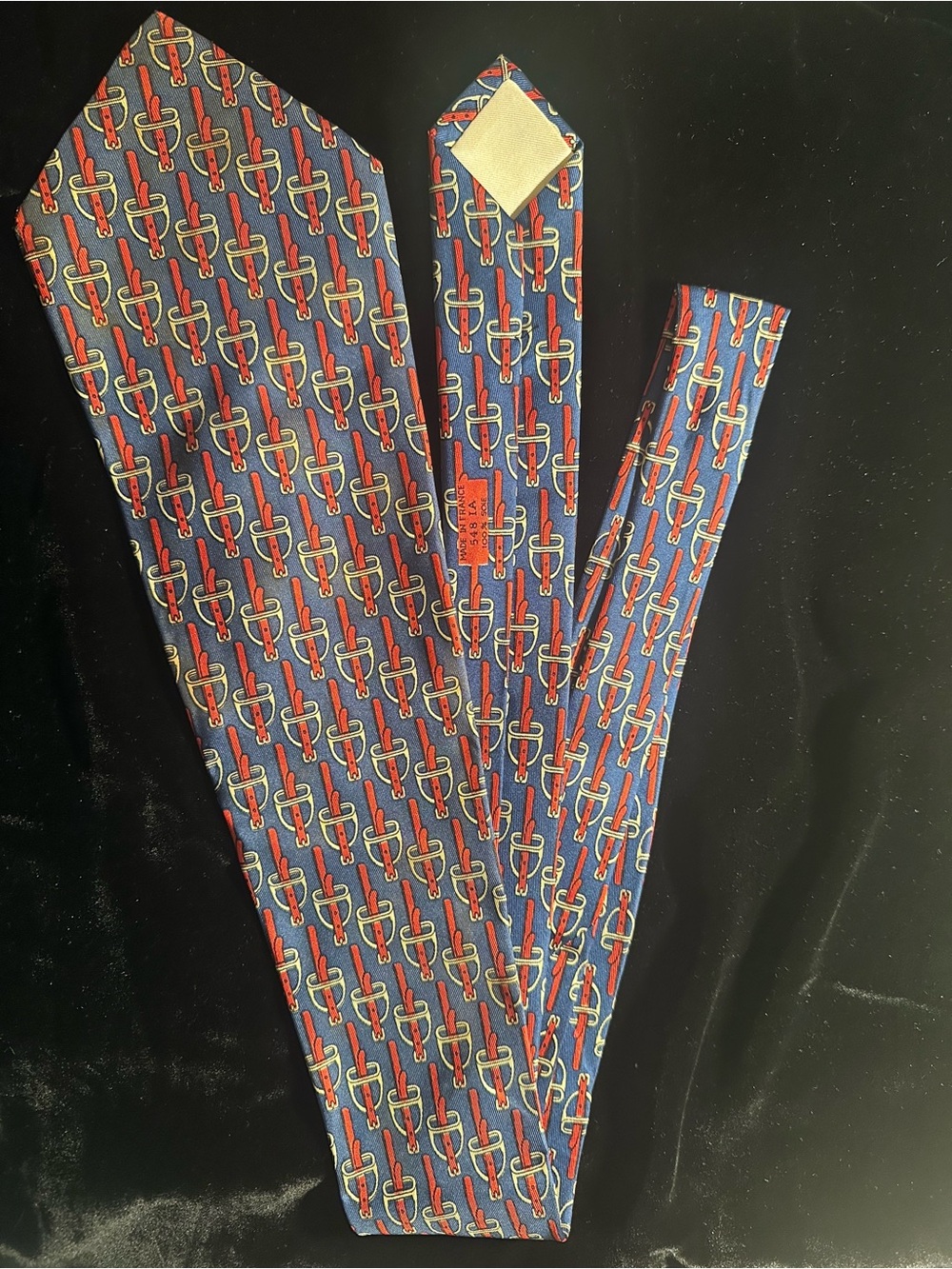 Hermes Blue Tie with Red and Cream Interlocking Motif